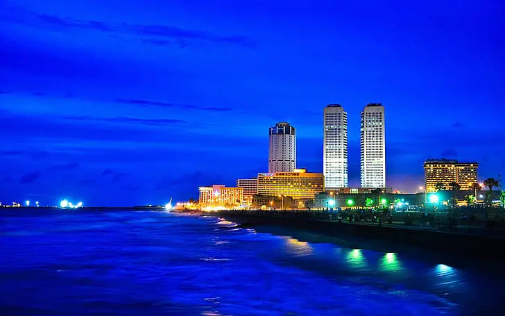 sri-lanka-coast-city-at-night-skyscrapers-lights-twin-tower-world-trade-center-wallpaper-preview